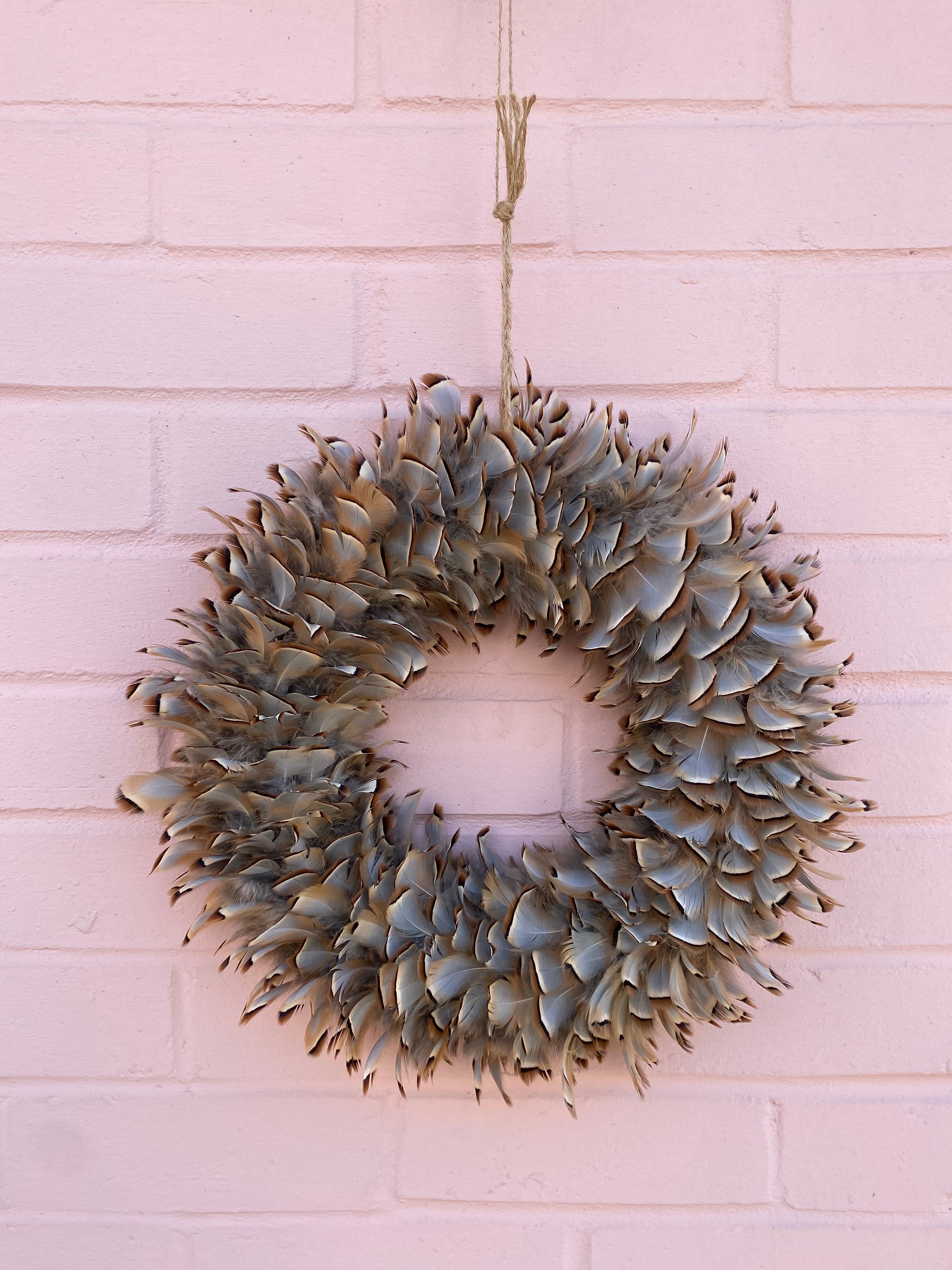 Homemade door wreath autumn feathers 