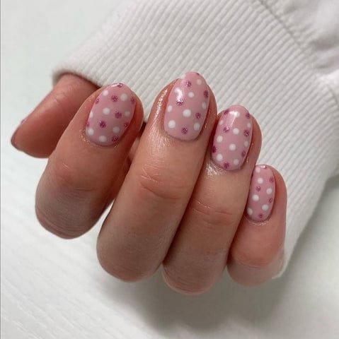 Nail art that speaks volumes of love! 💖 Embrace the charm of hearty nails  in delightful shades of pink North Gate Mall +974 5047 7430... | Instagram