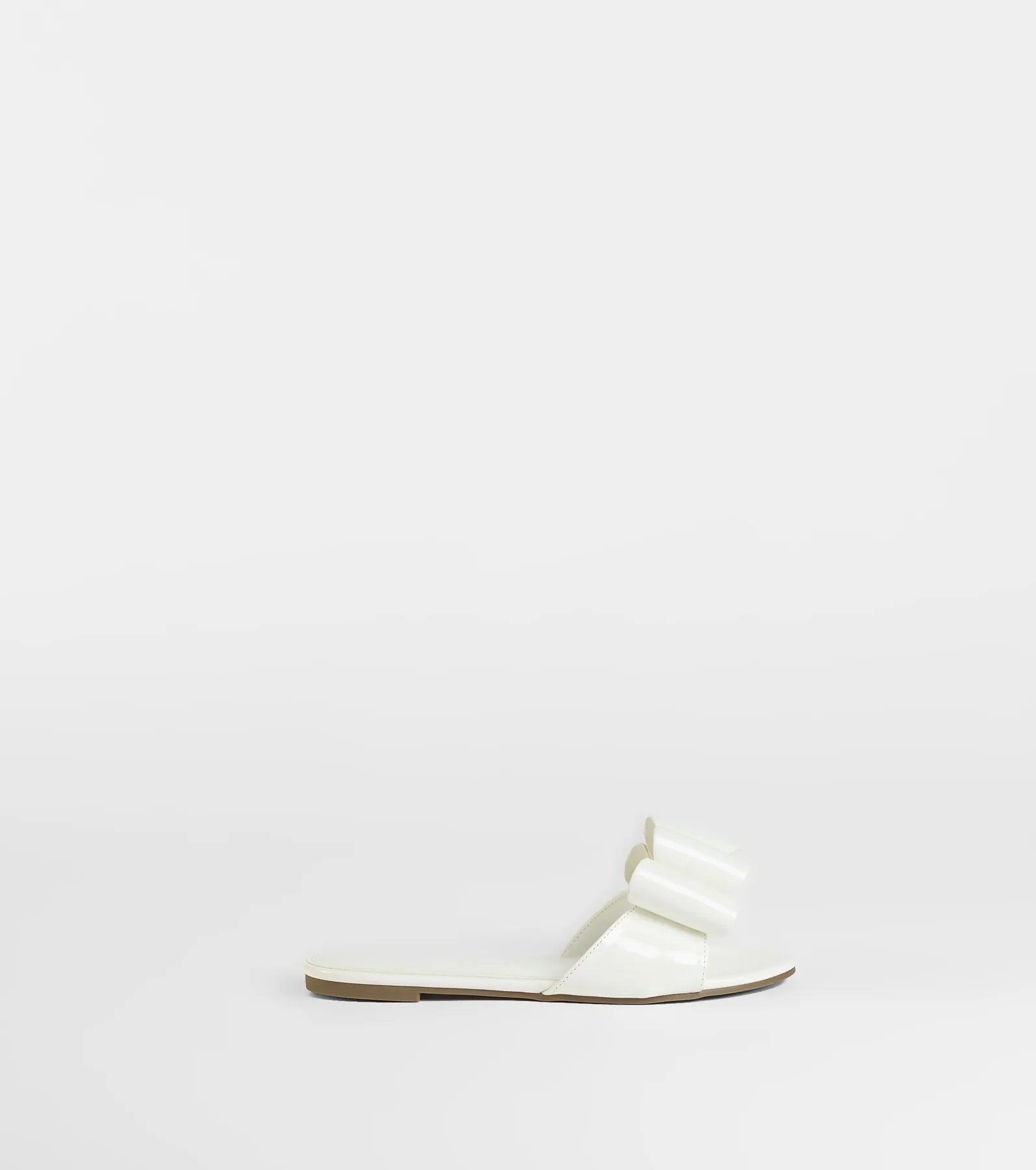 Charmed Intent Bow Sandals