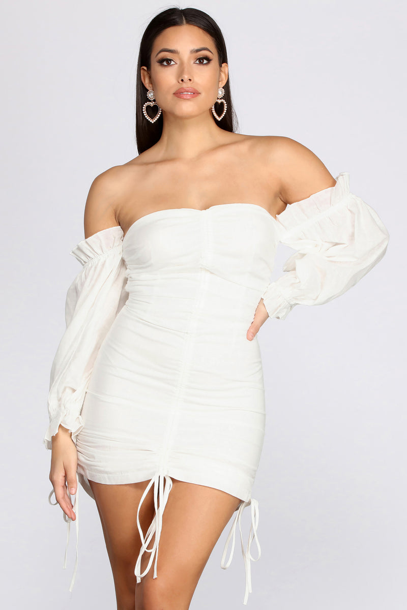 white mini dress off the shoulder