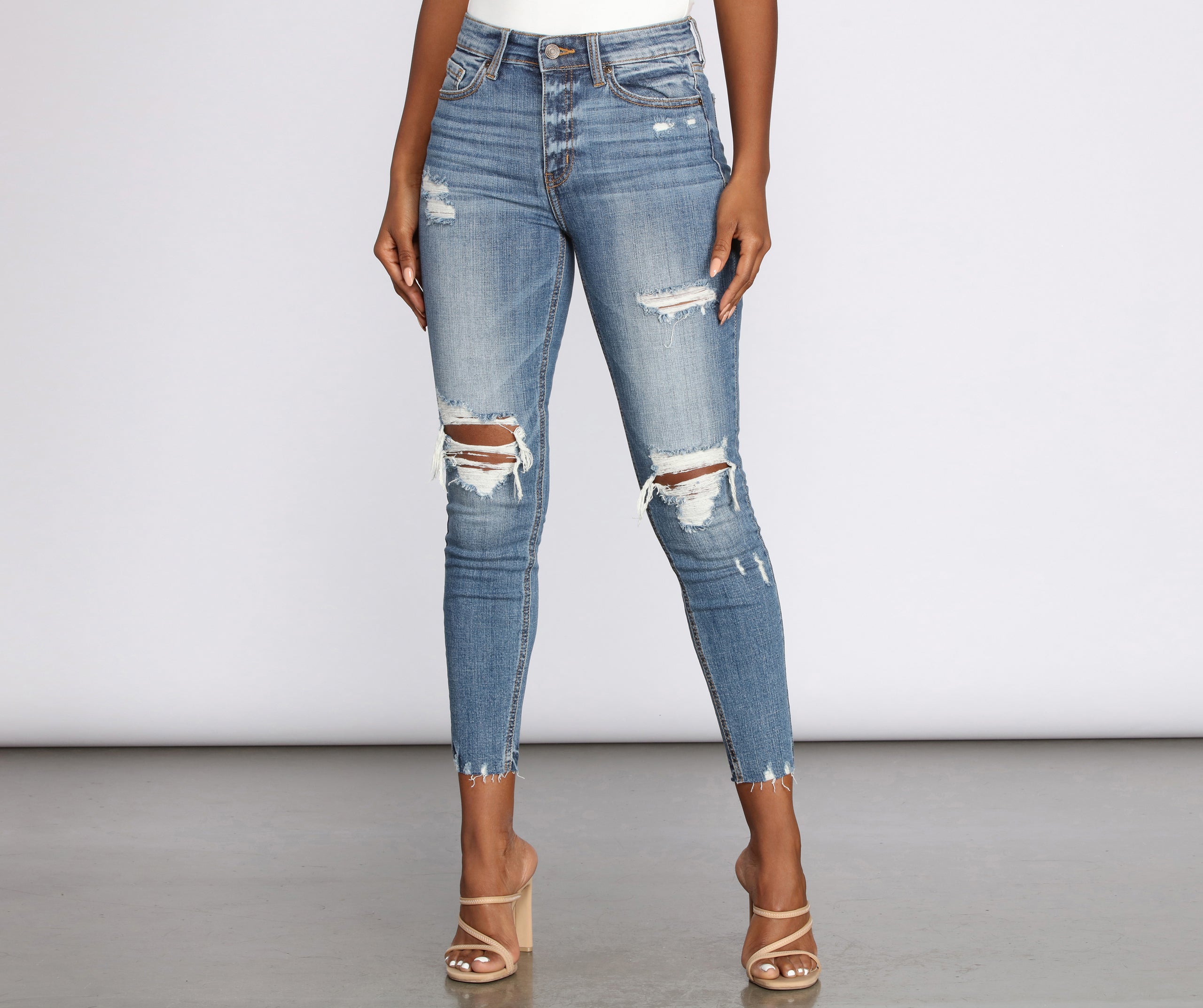 high waisted distressed jeans