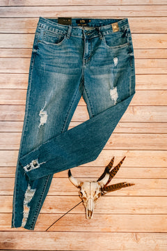 Distressed Hem Skinny Jeans