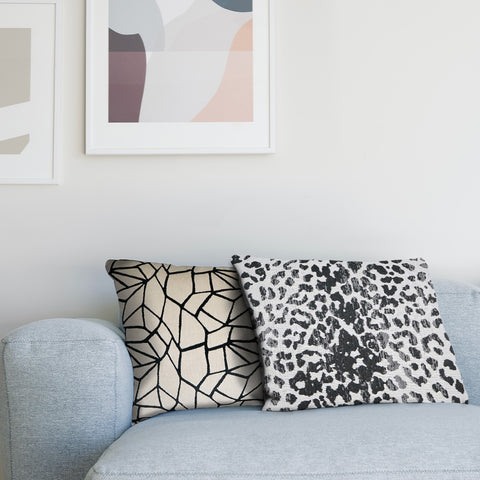 mix and match throw pillows on couch