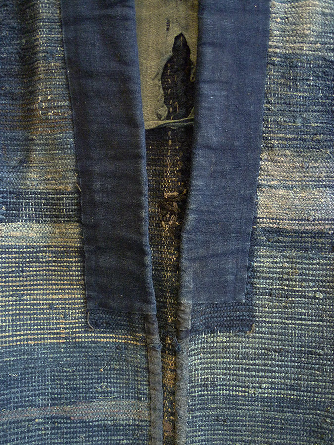 Sri | A Beautifully Worn Indigo Dyed Sakiori Sodenashi: Rag Woven Work Vest