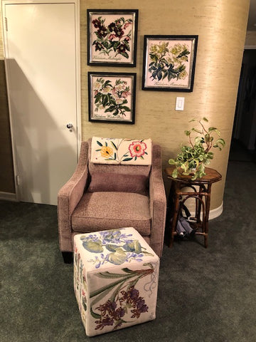 Chair with framed needlepoint tapestries and cubed needlepoint foot stool