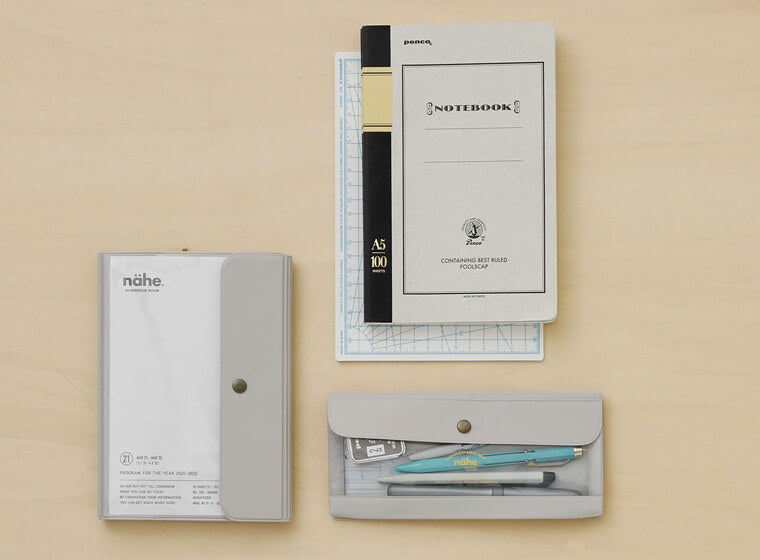 nähe general purpose case by hightide in wide size in ivory with planner and foolscap notebook