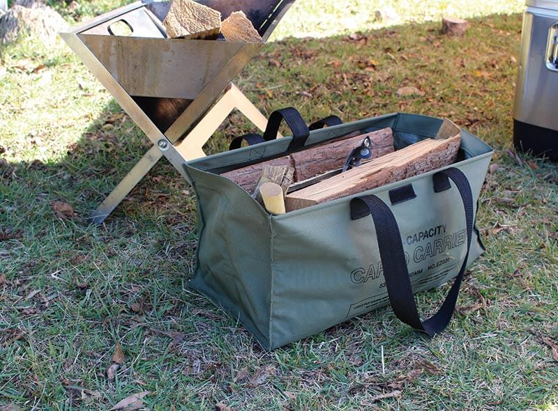 hightide cargo bag in khaki, large size used to store logs at a camping site