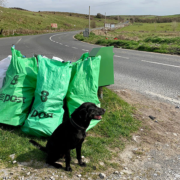 Lana guards the mail sacks