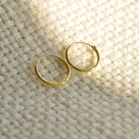 tiny gold hoops 