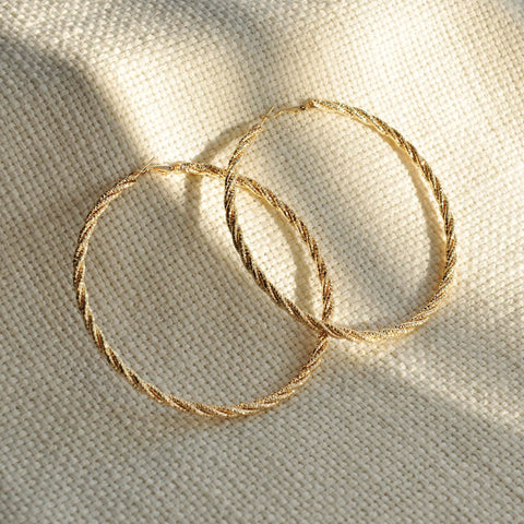 twist gold hoop earrings 