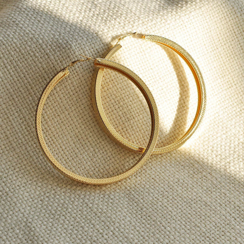wide gold hoop earrings