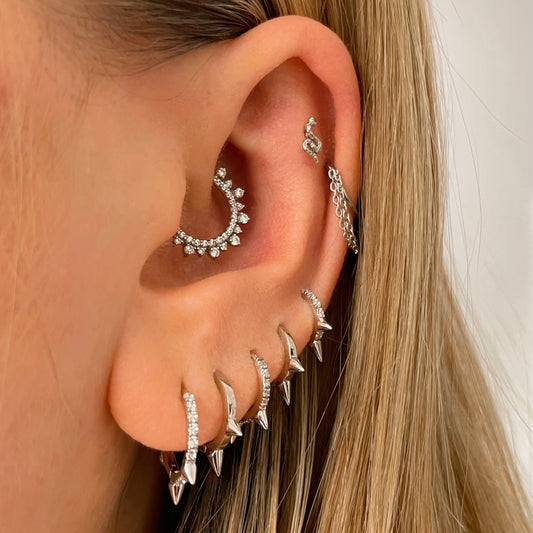 Spike huggie sale earrings