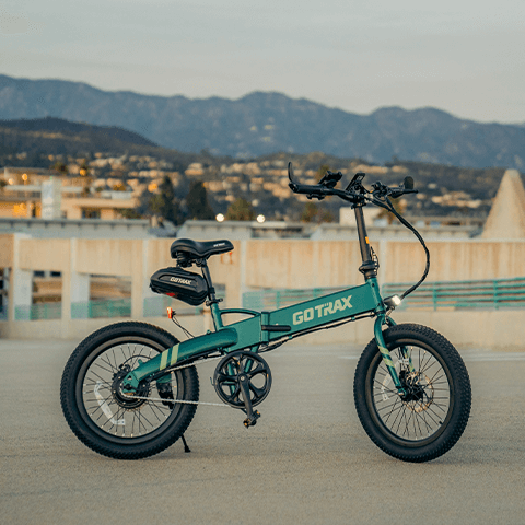 A shot of the GOTRAX F1 V2 folding electric bike showcasing the new green color.