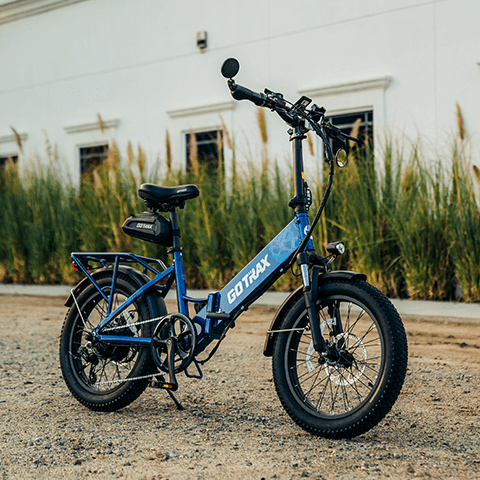 A shot of the GOTRAX F2 V2 folding electric bike showcasing the new blue frame color.