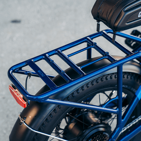 A closeup of the GOTRAX F2 V2 folding electric bike's new frame-welded rear cargo rack.