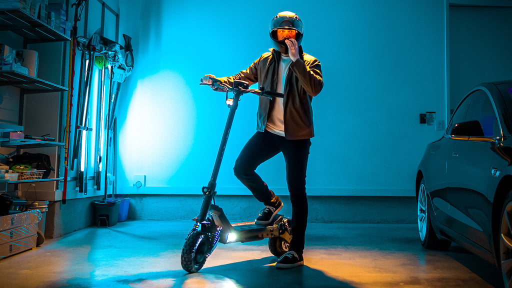 Man standing with the GOTRAX GX3 Dual Motor Electric Scooter