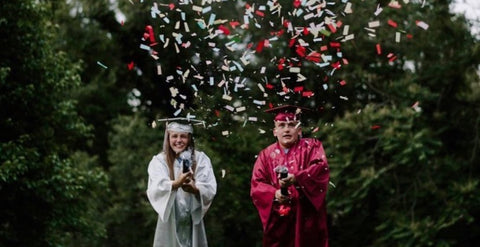 Graduates and confetti cannon