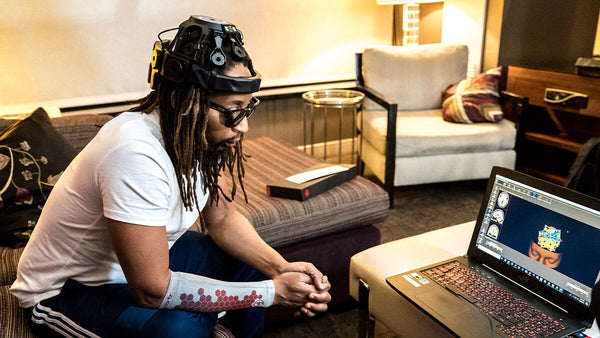 Lil Jon sees the results of his brain scan, before and after wearing smart compression technology.