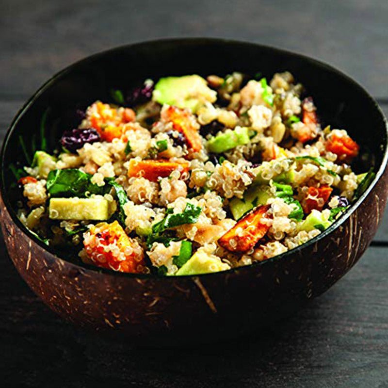 Couscous salad in a coconut bowl