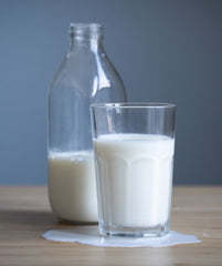milk in a bottle and glass