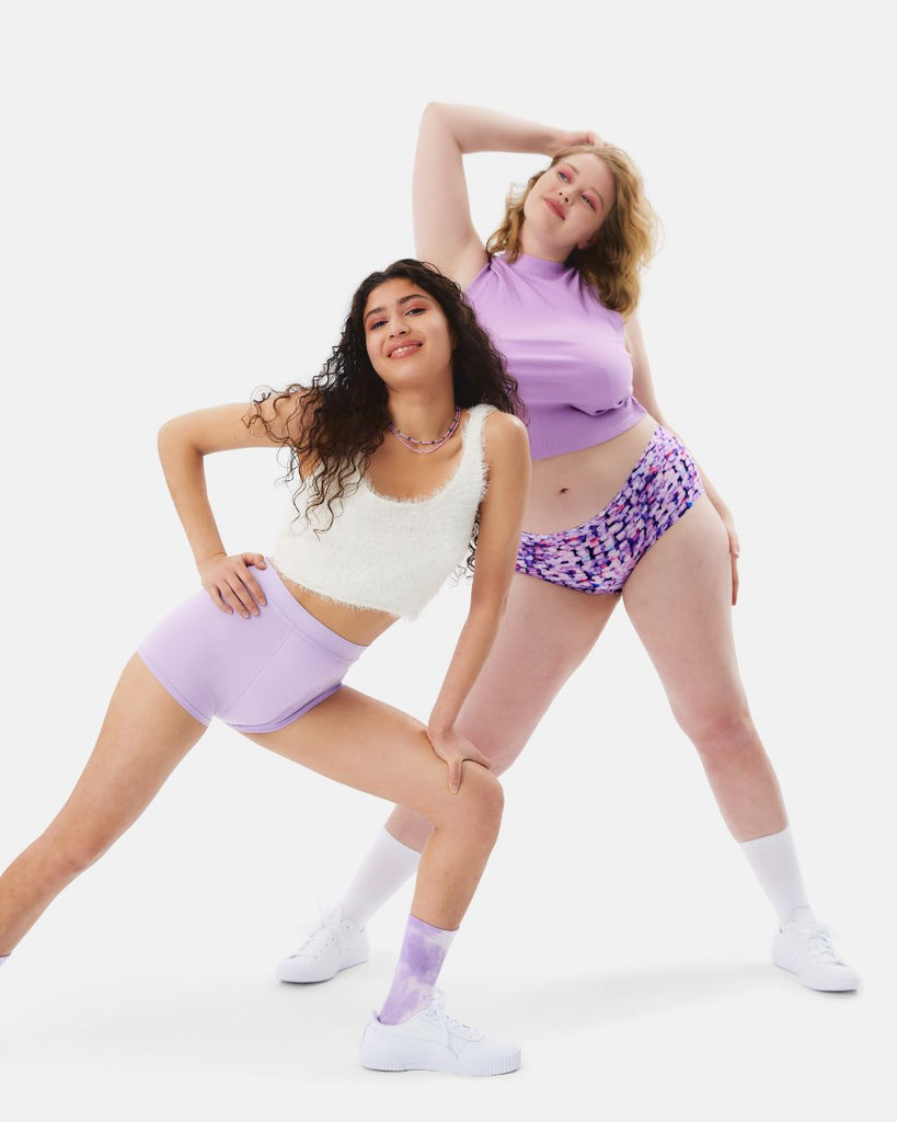 two teens wearing period underwear