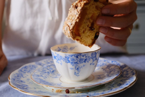 Slice of Panettone dipped in milk