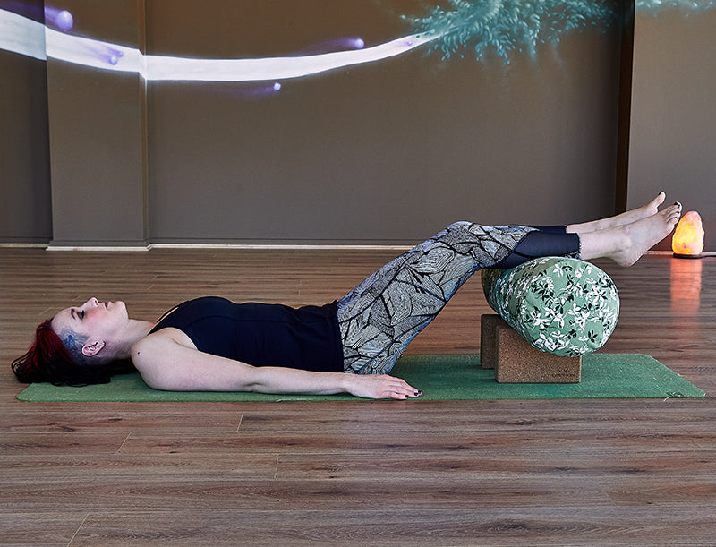 Stonehenge Yoga Pose using blocks and bolster