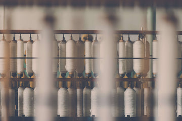 Organic cotton yorn being spun to produce slow fashion clothing