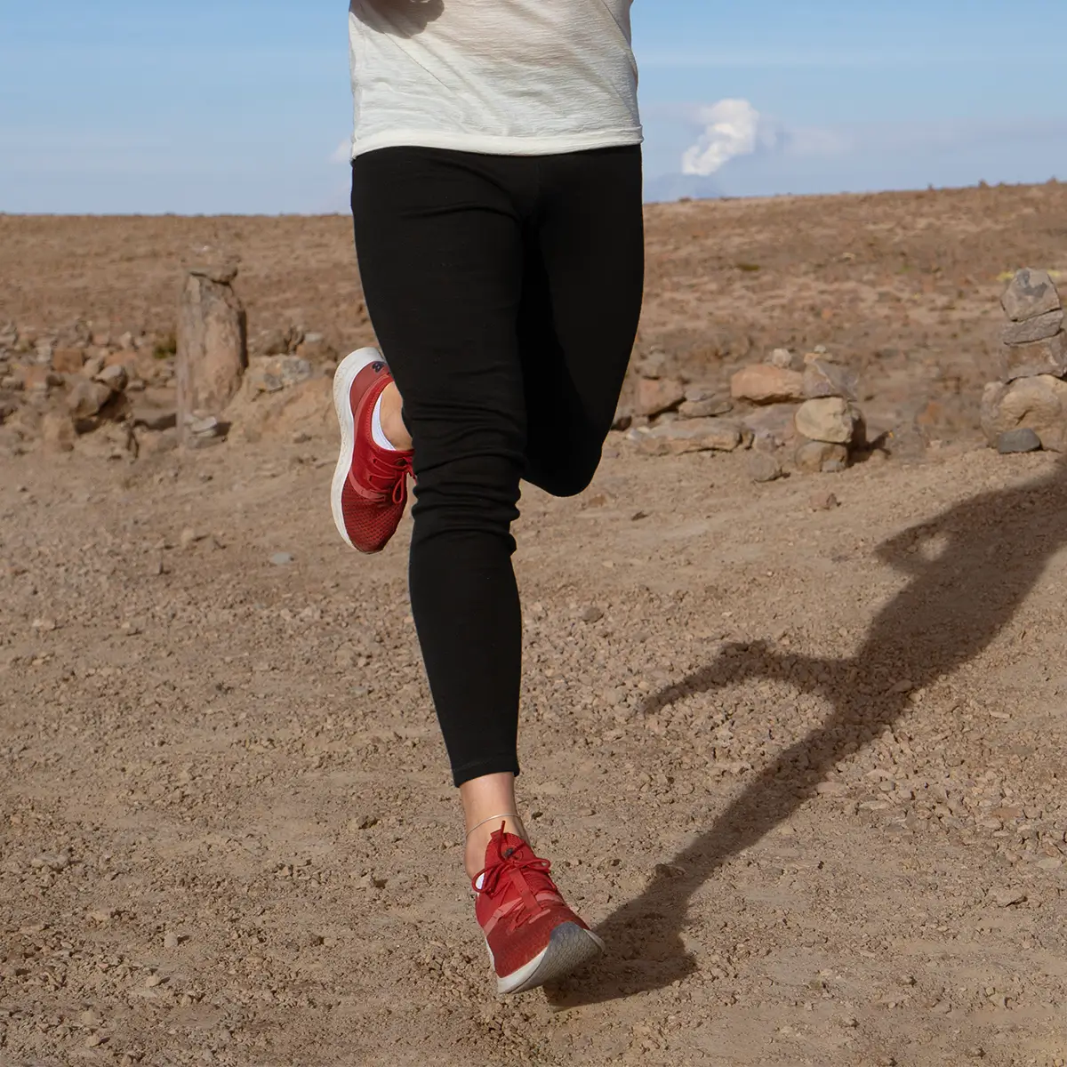 Man wearing alpaca wool leggings running