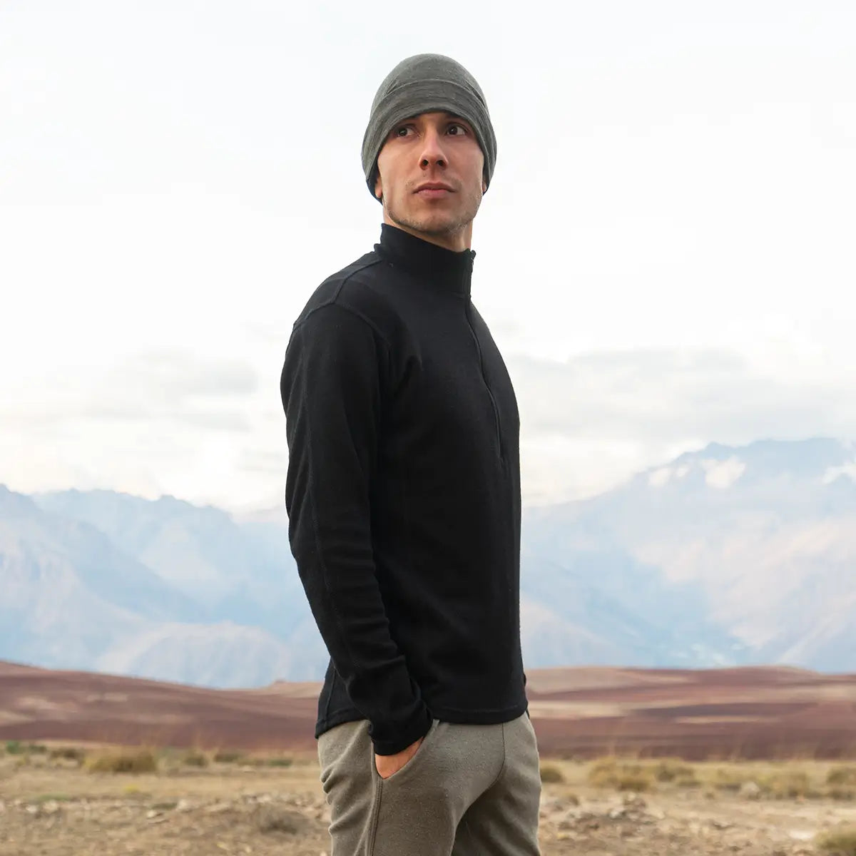 Man wearing alpaca wool base layer on a hike in the mountains