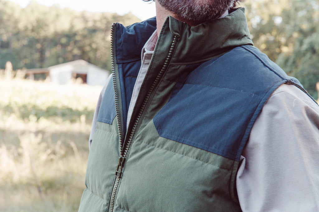 Man wearing Ryker Vest walking in the woods