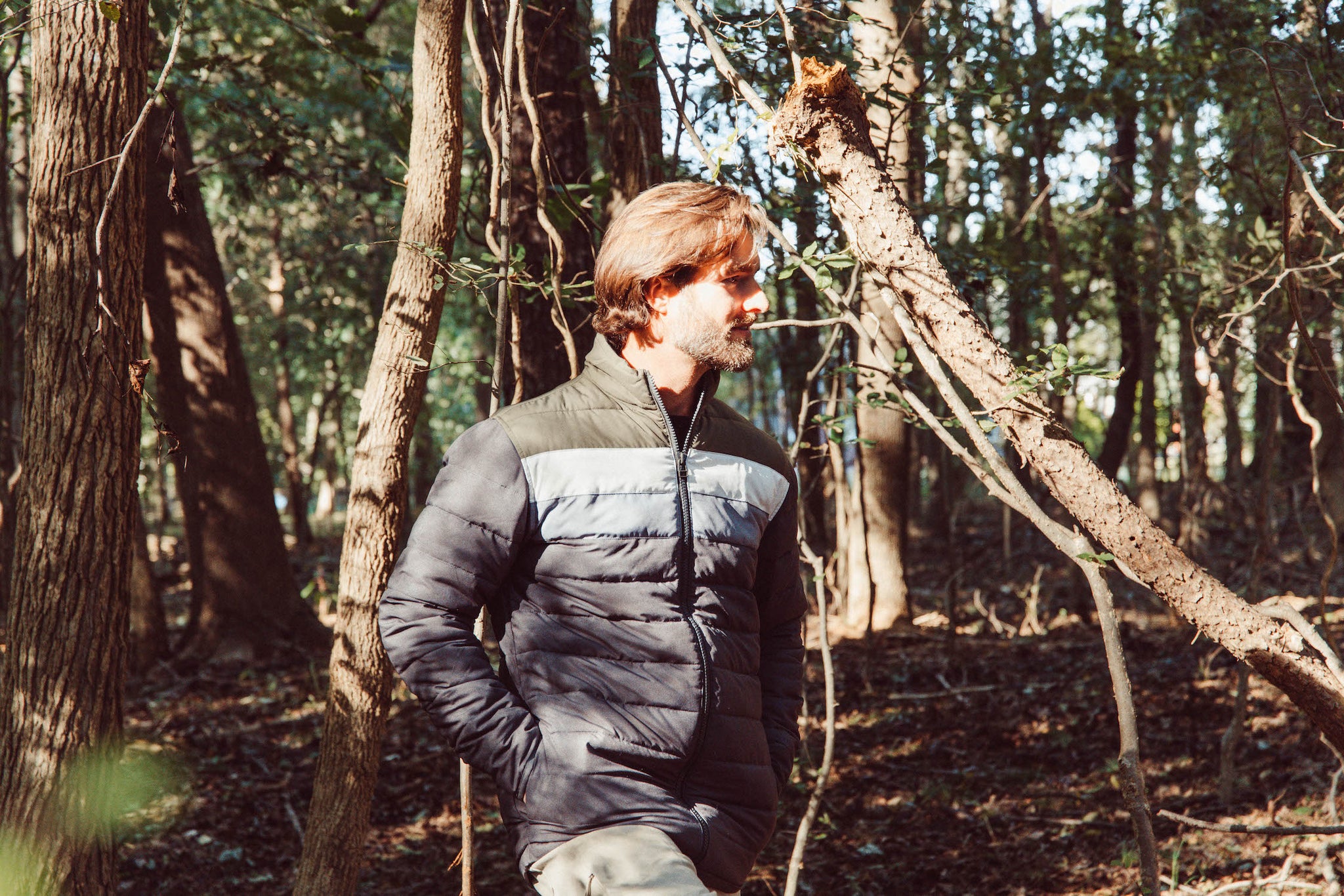 Man wearing Rider Jacket walking in the woods