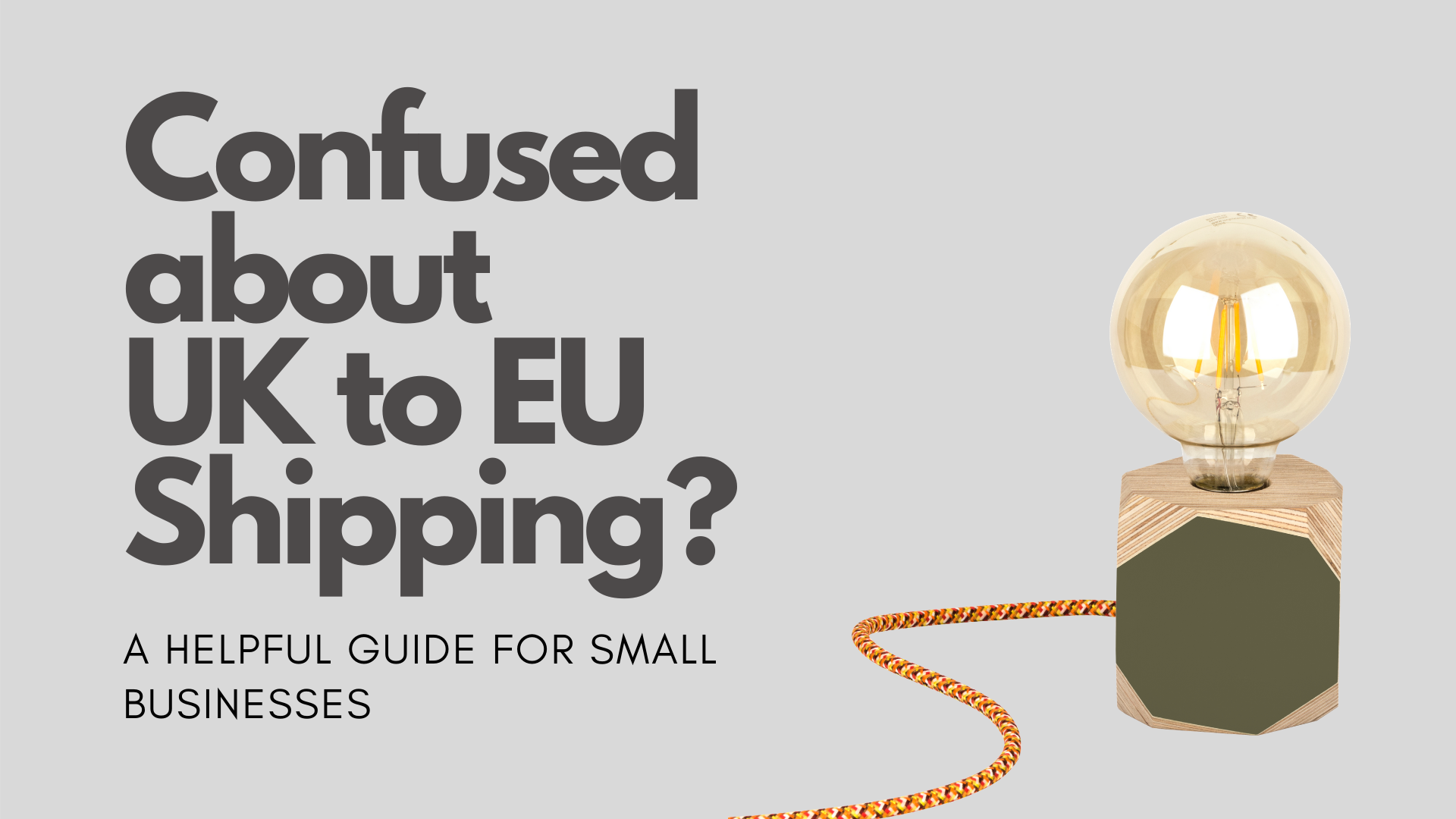 Confused about UK to EU Shipping - A helpful guide for businesses (Image is of a wooden lamp with globe filament bulb. Painted Olive Green with an orange cable)