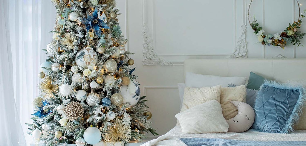White Christmas decor - simple wreath above bed 