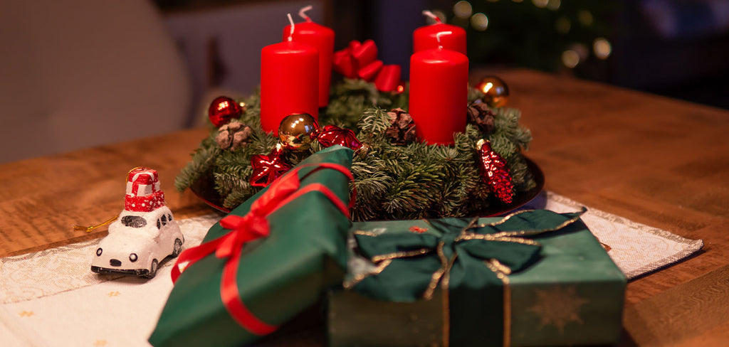 wreath centerpiece with red candles