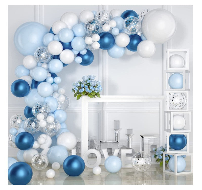 white and blue balloon garland