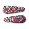 US stockist of Josie Joan's Abigail set of two fabric hair clips.  Cream colored fabric with red, pink, mustard and blue flowers.  Features scalloped edges.