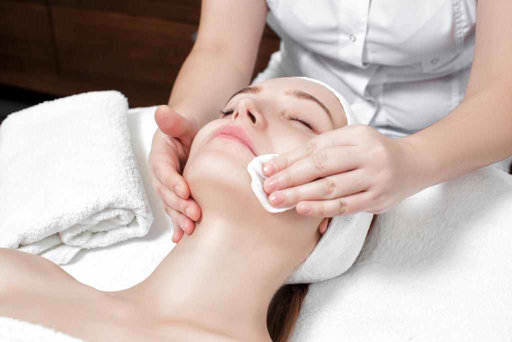 A woman receiving dermaplaning after care, dermaplaning side effects