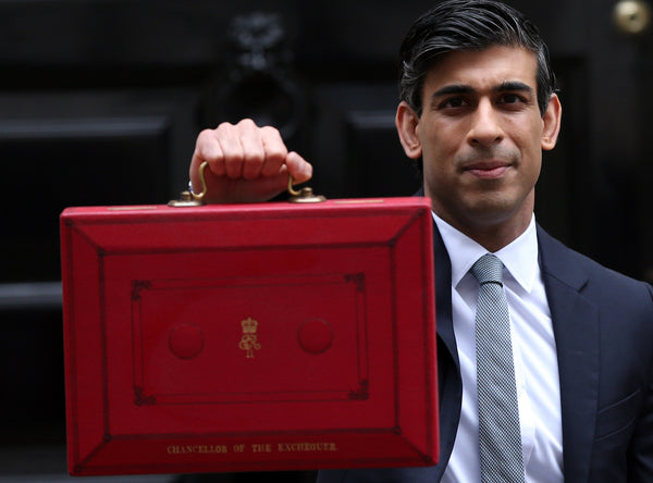 Rishi Sunak with briefcase up to public