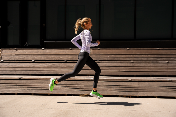Woman Running In CF1 Carbon