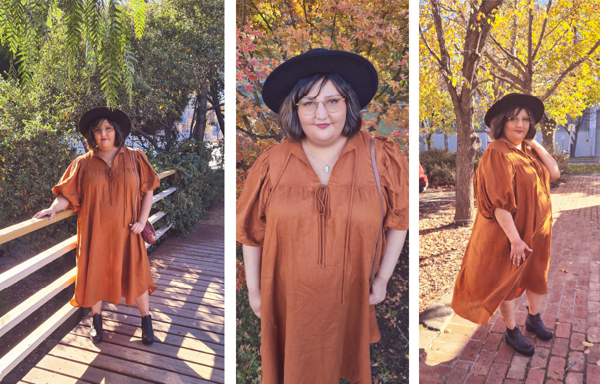 Three images of Vee, a dark haired women wearing her Vali dress in caramel rust linen.  She is wearing a black hat, black boots and mid length linen dress