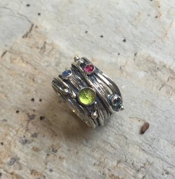https://artisanlook.com/products/birth-stones-ring-mothers-ring-sterling-silver-wide-band-unique-silver-ring-wide-ring-gypsy-ring-bohemian-ring-soft-swirls-r2064-4