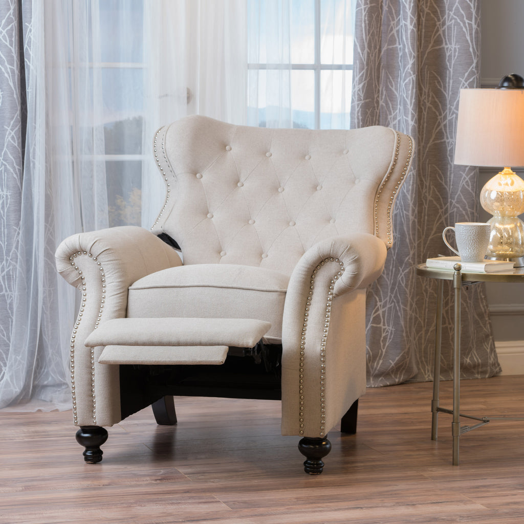 cream tufted recliner