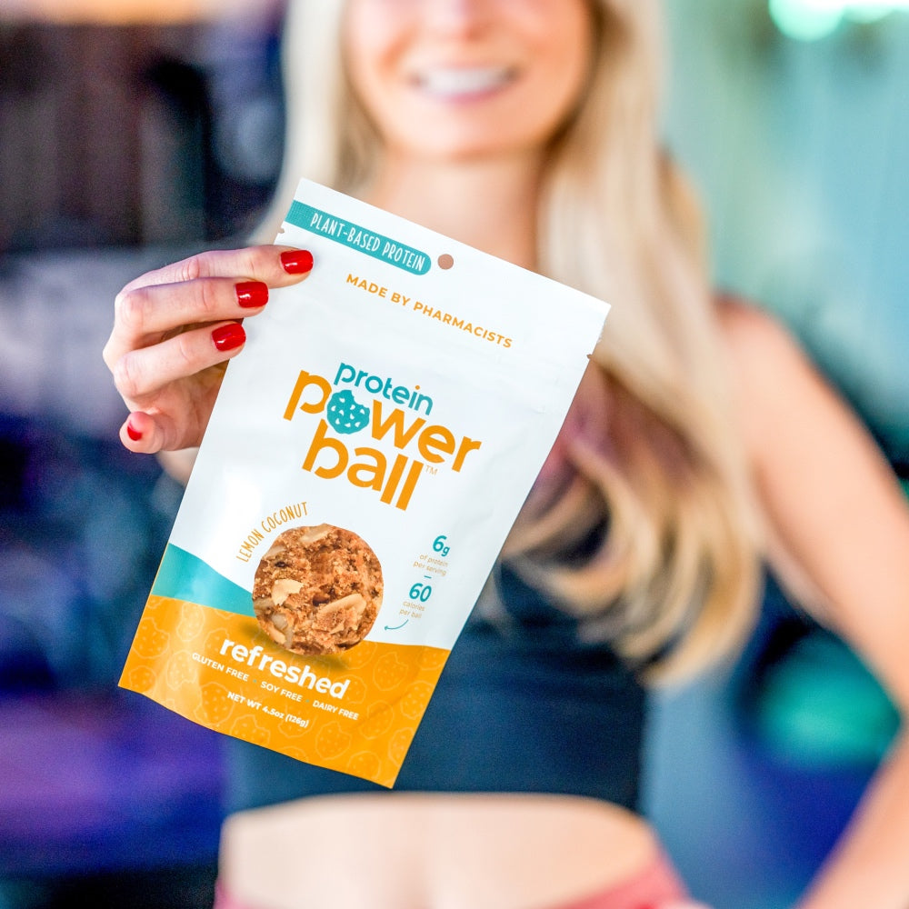 Someone holding Protein Power Ball