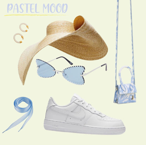 Un look pastel avec une combinaison en denim et le petit chiquito de Jacquemus