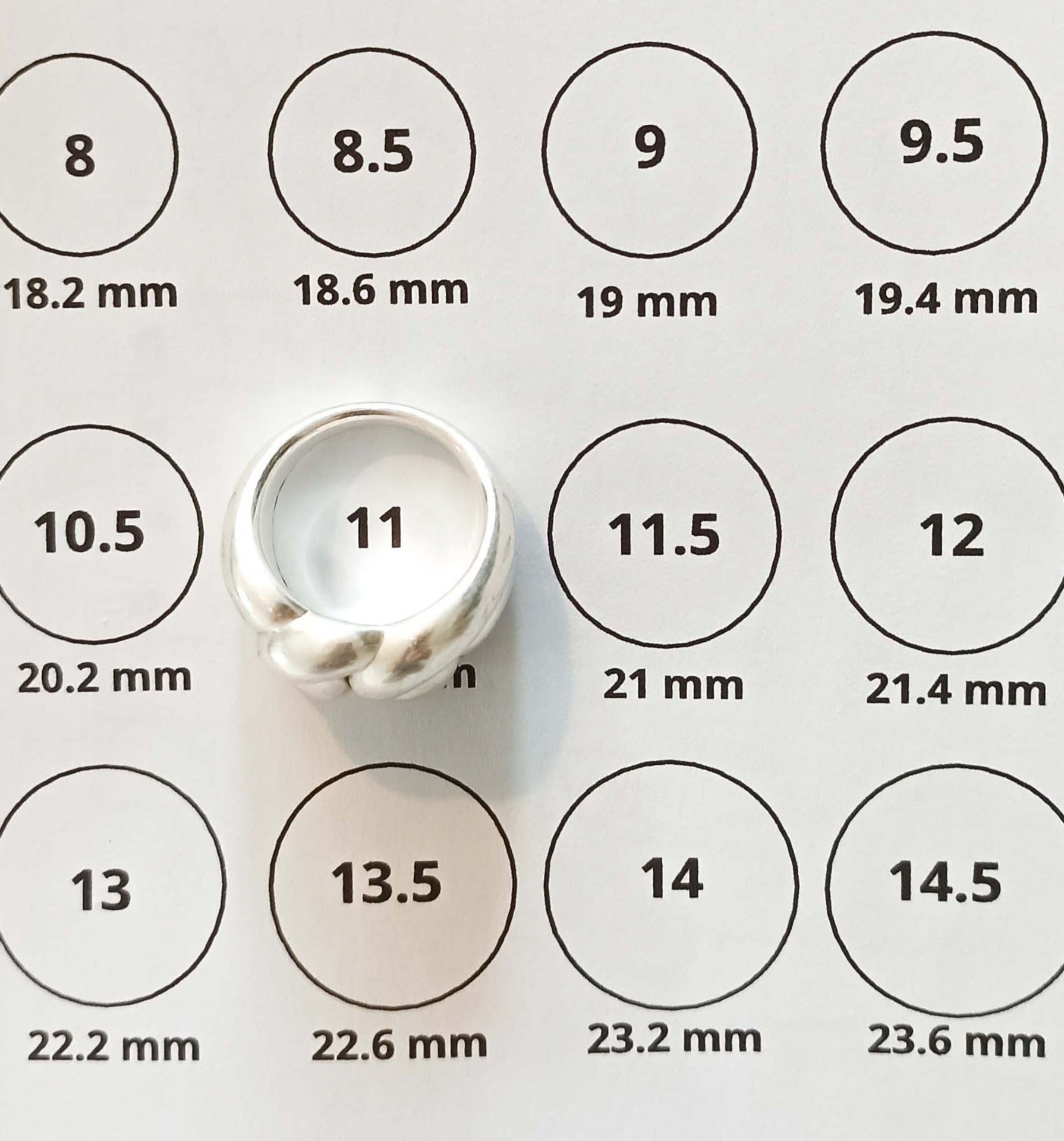 How can I measure my ring size at home?