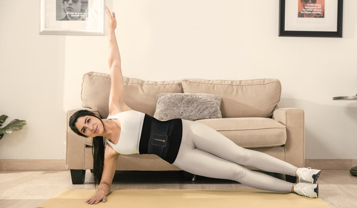 woman exercising to have a smaller waist with her Copper Slim Belt with Waist Trainer