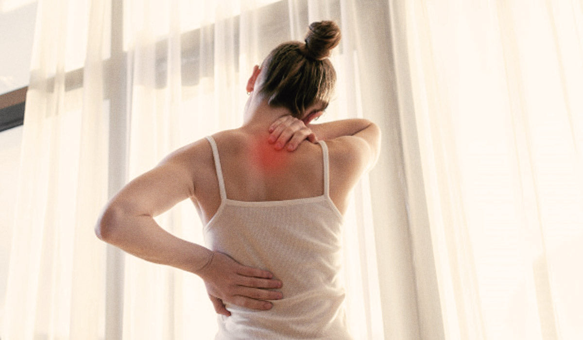 woman with back and neck pain