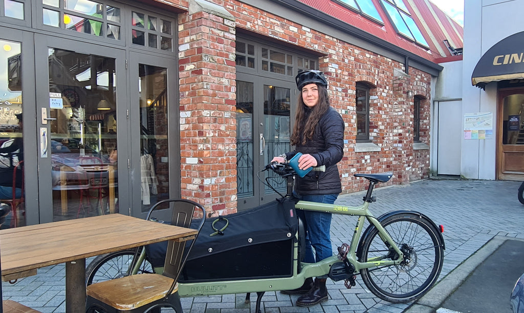Julia and the electric cargo bike that she commutes on