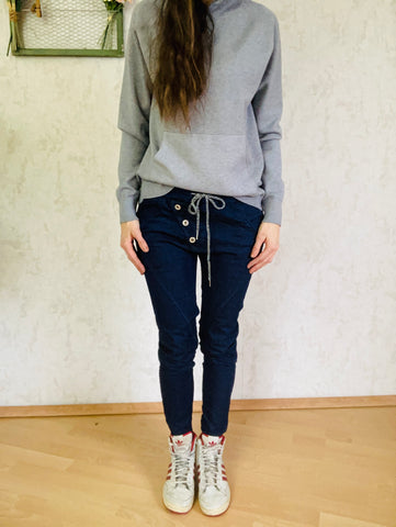 Woman with wide jeans pants